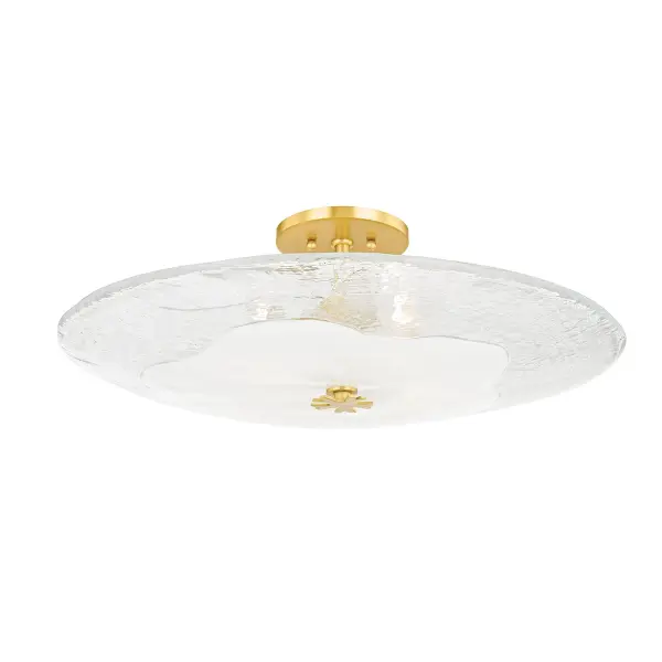 The Lago semi-flush mount showcases exceptional hand-blown piastra glass with a unique opaque Blonchino center. Light reflects beautifully off the ceiling, creating a mesmerizing ambient glow. The aged brass finial adds sophisticated warmth.