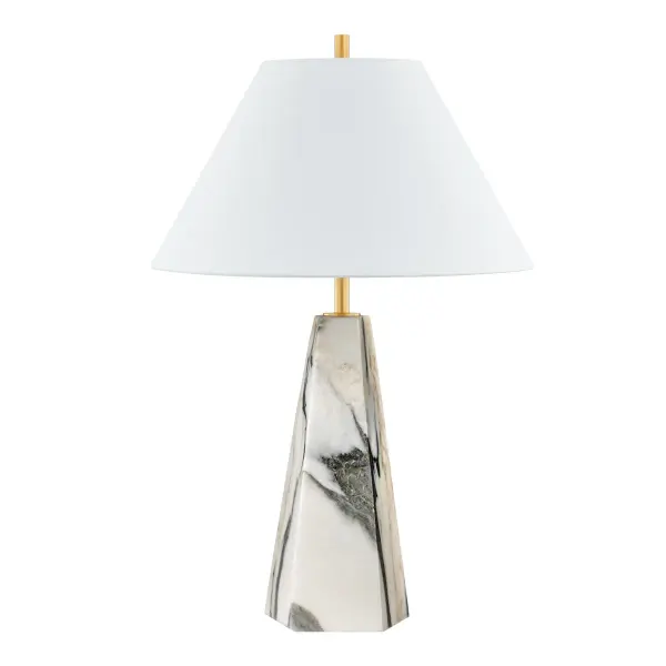 The Benicia combines natural stone luxury with modern design sensibility. Its pyramid-shaped Arabescato Corchia marble base creates a striking architectural presence, while the aged brass neck and soft linen shade balance the look with warmth and approachability.