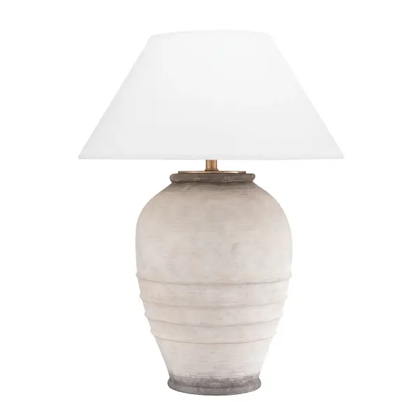 The Decatur table lamp combines natural ash wood with a clean white linen shade for a sophisticated organic modern aesthetic. At 33.5 inches tall with a substantial 21-inch diameter base, it makes a bold statement while maintaining versatility.