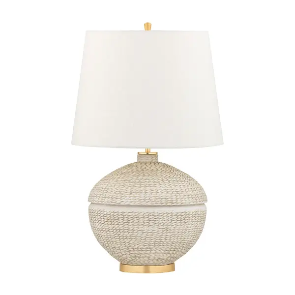 The Katonah brings organic texture and warmth through its trompe l'oeil basket design. The ceramic base features rope-like patterns with a pronounced ridge detail, complemented by gold leaf accents and an oversized linen shade.