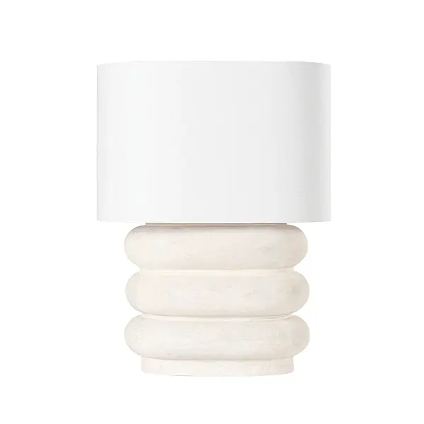 This Hudson Valley table lamp combines aged brass metalwork with weathered ivory ceramic for a sophisticated transitional look. The warm brass finish and textured ceramic base create visual interest while maintaining versatility across traditional and coastal interiors.