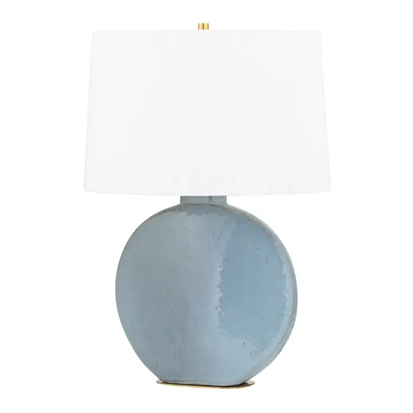 This Hudson Valley table lamp combines warm aged brass metalwork with a refined gray fabric shade, creating a versatile lighting solution that bridges traditional and contemporary aesthetics. The quality construction and timeless finish make it a sophisticated choice for multiple room settings.