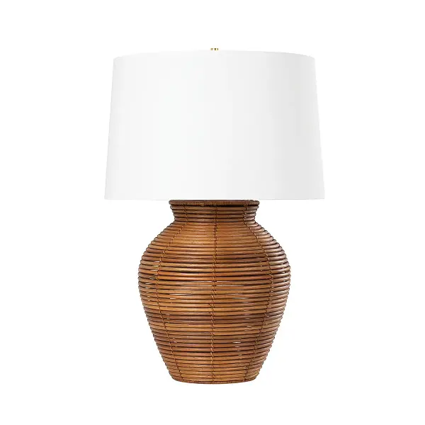 The Newark brings organic warmth and coastal elegance to any space with its natural rattan base and white Belgian linen shade. At nearly 30 inches tall, it makes a substantial statement while maintaining softness through natural materials.
