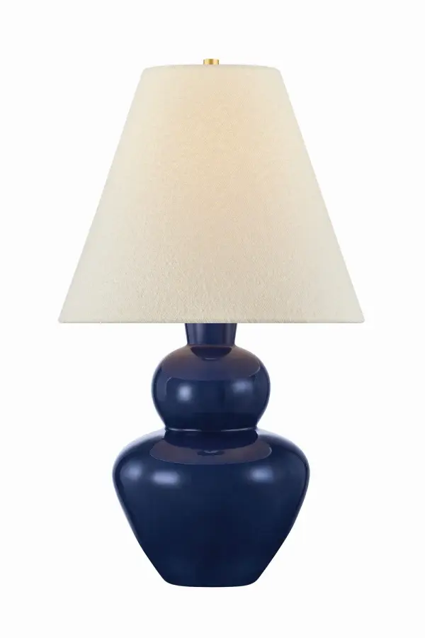 Sculptural and statement-making, the Dumont table lamp emphasizes its softly stacked voluminous curves with a vibrant, pigmented glaze. The glossy Egyptian Blue is made more dimensional by its reflectivity, which amplifies the spread of light. An elongated and tapered boucle shade provides additional texture, while concealed Aged Brass hardware completes the lamp. Due to the one-of-a-kind nature of the medium, exact colors and patterns may vary slightly from the image shown. Collection: Dumont Designer: Hudson Valley Lighting Finish: Aged Brass Glass: Boucle Width: 19.00" Height: 32.50" Weight: 15.43 lb Number of Bulbs: 1 Maximum Wattage: 15.00 W Bulb Type: A19 Bulb Base: E26 Medium Voltage: 120.00 V Material: Ceramic Country of Origin: VN Safety Listing: UL/cUL Safety Rating: Dry Switch: FULL RANGE DIMMER ON SOCKET Manufacturer Warranty: 1 Year Limited Manufacturer Spec Sheet Instructions