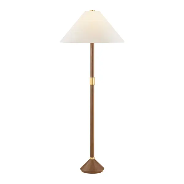 Guided by a thoughtful curation of materials, the Merrimack floor lamp pairs the natural grain of walnut wood with a timeless tapered white linen shade. At the base and midpoint, Aged Brass cuff accents add a jewelry-like detail, reminiscent of stacked rings. The organic patterning of the wood lends a dose of character to the heritage silhouette. Due to the one-of-a-kind nature of the medium, exact colors and patterns may vary slightly from the image shown. Collection: Merrimack Designer: Hudson Valley Lighting Finish: Aged Brass Glass: White Linen Width: 25.50" Height: 64.50" Weight: 15.07 lb Number of Bulbs: 1 Maximum Wattage: 15.00 W Bulb Type: A19 Bulb Base: E26 Medium Voltage: 120.00 V Material: Natural Woven Country of Origin: VN Safety Listing: UL/cUL Safety Rating: Dry Switch: FULL RANGE DIMMER ON SOCKET Manufacturer Warranty: 1 Year Limited Manufacturer Spec Sheet Instructions