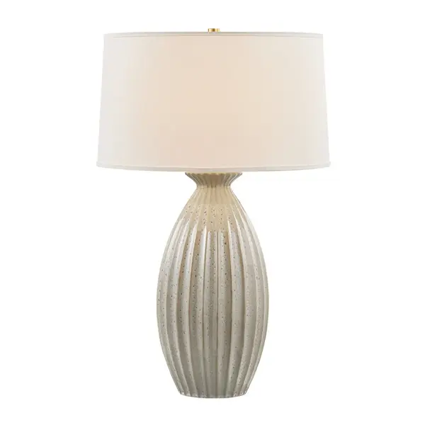 A serene palette and deep fluting create visual intrigue in the organic, pod-like silhouette of the Box Elder table lamp. As the Taupe Velvet glaze reacts across the surface of the ceramic base, it creates dark highlights at the ridges and a lighter tone in the valleys. Balanced by a crisp white linen drum shade and finished with Aged Brass hardware, this lamp adds an earthy accent to any space. Due to the one-of-a-kind nature of the medium, exact colors and patterns may vary slightly from the image shown. Collection: Box Elder Designer: Hudson Valley Lighting Finish: Aged Brass Glass: White Linen Width: 19.50" Height: 30.00" Weight: 11.91 lb Number of Bulbs: 1 Maximum Wattage: 15.00 W Bulb Type: A19 Bulb Base: E26 Medium Voltage: 120.00 V Material: Ceramic Country of Origin: VN Safety Listing: UL/cUL Safety Rating: Dry Switch: FULL RANGE DIMMER ON SOCKET Manufacturer Warranty: 1 Year Limited Manufacturer Spec Sheet Instructions