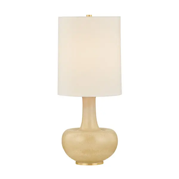 The Plum Point table lamp takes a sculptural silhouette and washes it in a creamy, golden hue. The softly rounded, gourd-like base dimples inward before extending into an elongated white linen shade. A Biscotti reactive glaze envelops the ceramic in an earthy richness with natural tonal variation. Finished with Aged Brass hardware, this lamp serves as an artistic accent piece for side tables and desks. Collection: Plum Point Designer: Hudson Valley Lighting Finish: Aged Brass Glass: Textured Linen Width: 12.00" Height: 28.00" Weight: 11.02 lb Number of Bulbs: 1 Maximum Wattage: 15.00 W Bulb Type: A19 Bulb Base: E26 Medium Voltage: 120.00 V Material: Ceramic Country of Origin: VN Safety Listing: UL/cUL Safety Rating: Dry Switch: FULL RANGE DIMMER ON SOCKET Manufacturer Warranty: 1 Year Limited Manufacturer Spec Sheet Instructions