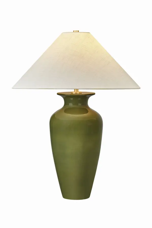 This Hudson Valley table lamp combines classic aged brass metalwork with refined glass detailing. Its transitional design bridges traditional and contemporary aesthetics, making it versatile for various interior styles.