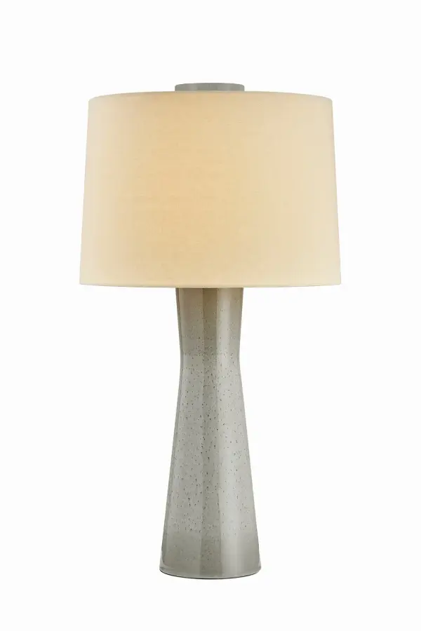 This single-light table lamp from Hudson Valley Lighting combines classic aged brass metalwork with refined glass detailing. Its transitional design bridges traditional and contemporary aesthetics, making it versatile for various interior styles.