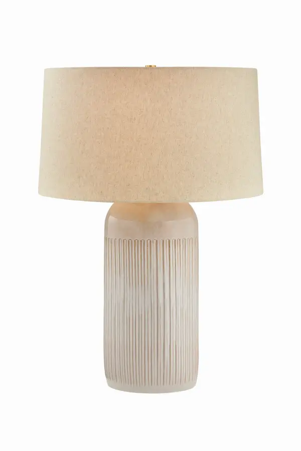 This Hudson Valley table lamp combines classic brass craftsmanship with contemporary sensibility. The aged brass finish adds warmth and character, while the single-light design provides focused illumination perfect for reading or ambient lighting.