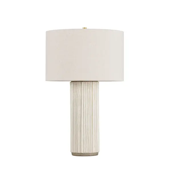 This sophisticated table lamp combines classic fluted ceramic with warm aged brass accents, creating a versatile piece that bridges traditional and contemporary aesthetics. The ivory ceramic body provides textural interest while maintaining a clean, refined profile.