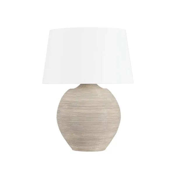 This sophisticated table lamp combines warm aged brass metalwork with a handcrafted ceramic artisan cream shade, creating a refined transitional aesthetic that bridges traditional and contemporary design sensibilities.