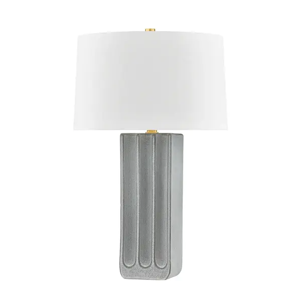 This Hudson Valley table lamp combines warm aged brass metalwork with a distinctive ceramic granite element, creating a refined transitional aesthetic. The compact design works beautifully as task or ambient lighting in residential and hospitality settings.