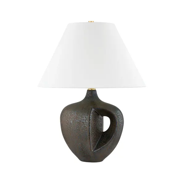 This Hudson Valley table lamp combines aged brass metalwork with reactive bronze ceramic elements for a refined, transitional aesthetic. The mixed-material design adds textural interest while maintaining versatility across traditional and contemporary interiors.
