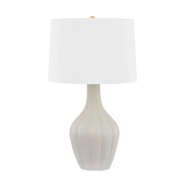 This Hudson Valley table lamp combines a handcrafted ceramic base in a soft Misty Morning glaze with aged brass metalwork. The organic form and warm finish create a sophisticated accent piece that bridges traditional and contemporary aesthetics.