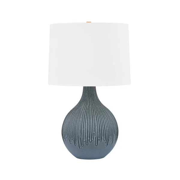 This Hudson Valley table lamp combines a striking Providence Blue ceramic base with aged brass metalwork for a sophisticated transitional look. The rich blue ceramic finish adds a pop of color while maintaining versatility across traditional and coastal design schemes.