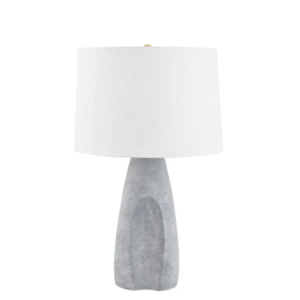 This Hudson Valley table lamp combines organic ceramic craftsmanship with refined aged brass accents. The stonewash ceramic finish adds textural depth and visual interest, making it a versatile accent piece for transitional and contemporary interiors.