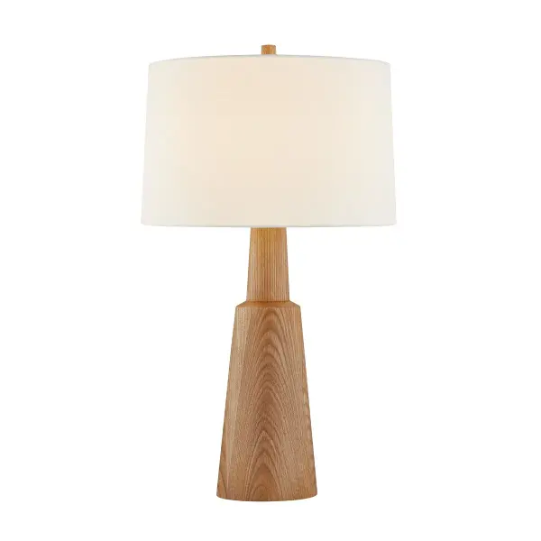 The Dennis table lamp balances organic warmth with refined simplicity. Its tapered white oak base showcases natural wood grain, while aged brass hardware and a crisp white linen shade add polish. The artisanal stepped neck detail elevates this beyond basic task lighting.
