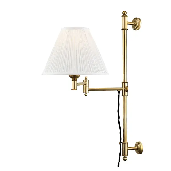 Mark D. Sikes delivers a refined wall sconce that balances classic proportions with contemporary functionality. The slender profile and delicate curves create visual interest without overwhelming a space, while the plug-in design offers installation flexibility.