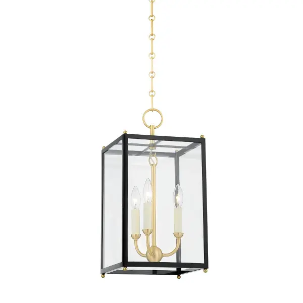 This three-light lantern combines timeless design with a distinctive aged brass and darkest blue finish. The traditional lantern silhouette works beautifully in transitional spaces, offering versatile style that bridges classic and contemporary aesthetics.