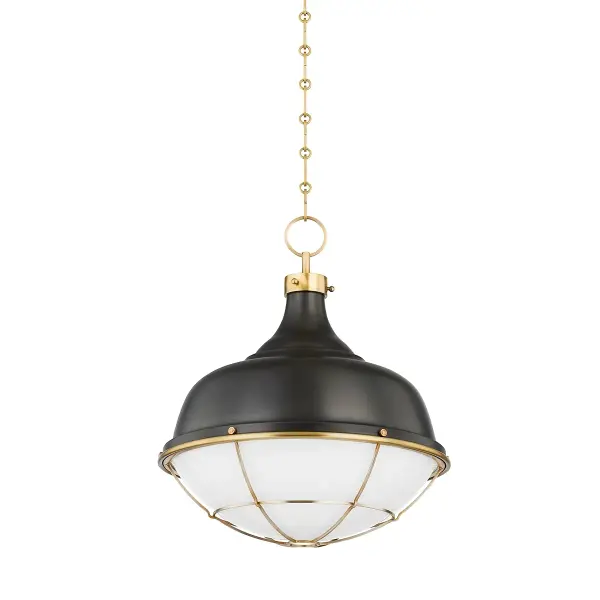 This Hudson Valley pendant combines aged brass and distressed bronze finishes for a refined, layered look. The single-light design works beautifully in intimate spaces or as part of a grouped installation over islands and bars.