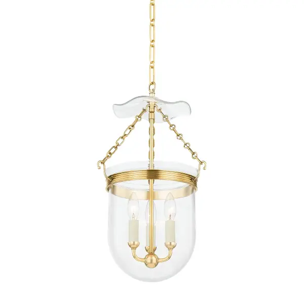 The Rousham lantern modernizes the classic bell jar with refined details like ribbed metal banding and flowing glass accents. Part of the Mark D. Sikes collection, it brings sophisticated warmth to traditional and contemporary spaces alike.