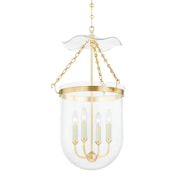 The Rousham lantern beautifully bridges traditional and modern design with its flowing bell jar silhouette, ribbed metal banding, and refined Aged Brass finish. Part of the Mark D. Sikes collection, it brings sophisticated style to entryways and dining spaces.