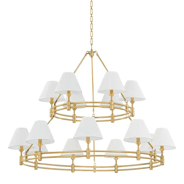 The Howard 15-light chandelier commands attention with its impressive 50-inch diameter and sophisticated two-tier design. Silk shades soften the light while aged brass finish adds warmth and character. A showstopping centerpiece for grand spaces.