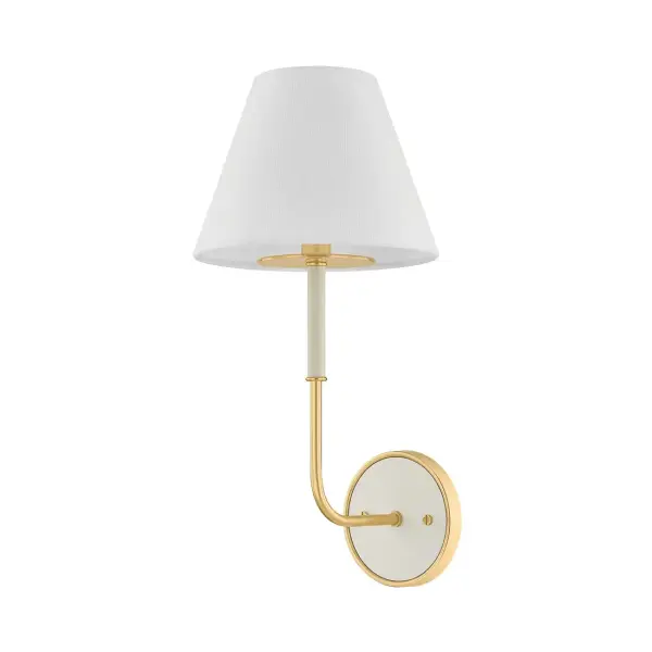 This Hudson Valley wall sconce combines aged brass metalwork with an off-white fabric shade for a refined, versatile look. Perfect for adding ambient lighting to bedrooms, hallways, and bathrooms with a transitional aesthetic.