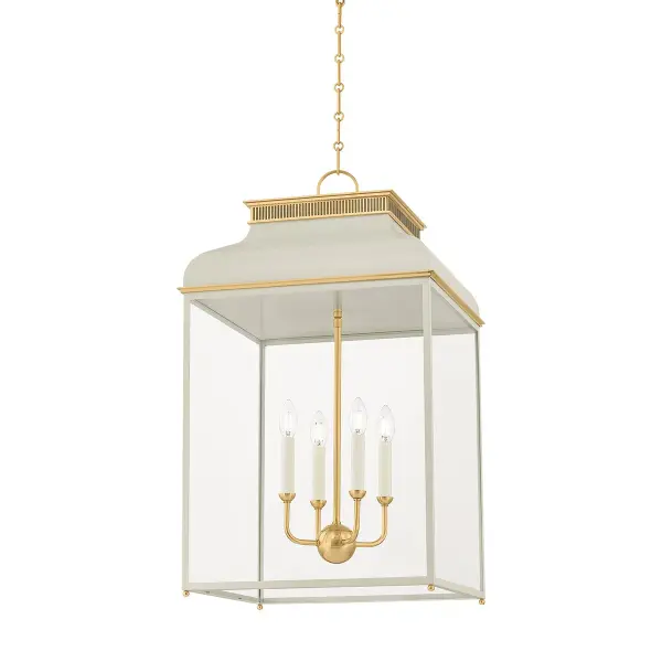 This sophisticated lantern combines classic design with refined materials. The aged brass frame paired with off-white fabric shades creates a warm, inviting glow perfect for grand entryways and formal dining spaces.