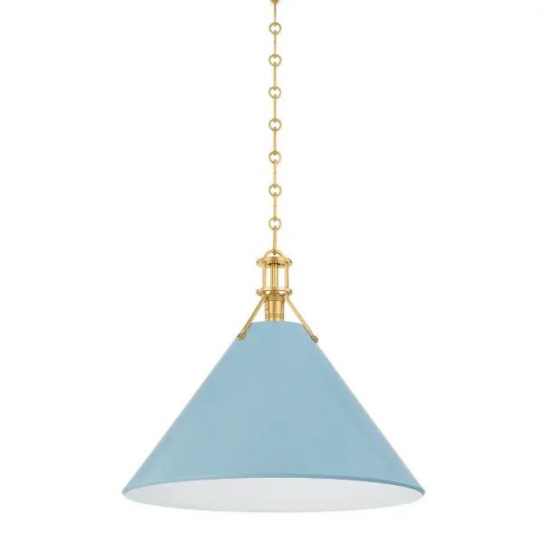 This Hudson Valley pendant combines warm aged brass metalwork with a striking blue bird glass shade, creating a sophisticated focal point. The single-light design offers refined illumination perfect for intimate spaces.