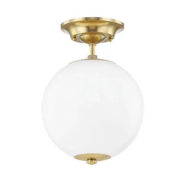 The Sphere No.1 combines a classic spherical opal glass shade with refined aged brass detailing, making it ideal for smaller spaces that need both ambient light and visual interest without overwhelming the room.