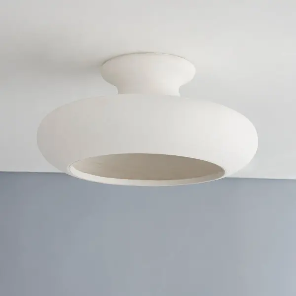 The Annie Semi Flush combines artisanal ceramic craftsmanship with modern sensibility. Its hand-thrown bowl aesthetic and finely textured white ceramic shade create a soothing ambiance, perfect for intimate spaces seeking organic warmth. - alternate view