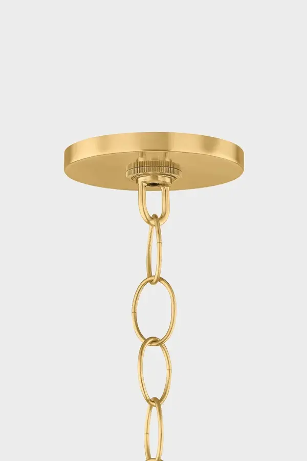 The April Pendant showcases vintage basketry craftsmanship with its large wicker shade featuring distinctive open-weave bands that create beautiful light patterns. The antique gold brass chain adds refined contrast to the natural materials, making it perfect for coastal, organic modern, or transitional spaces seeking warmth and character. - alternate view