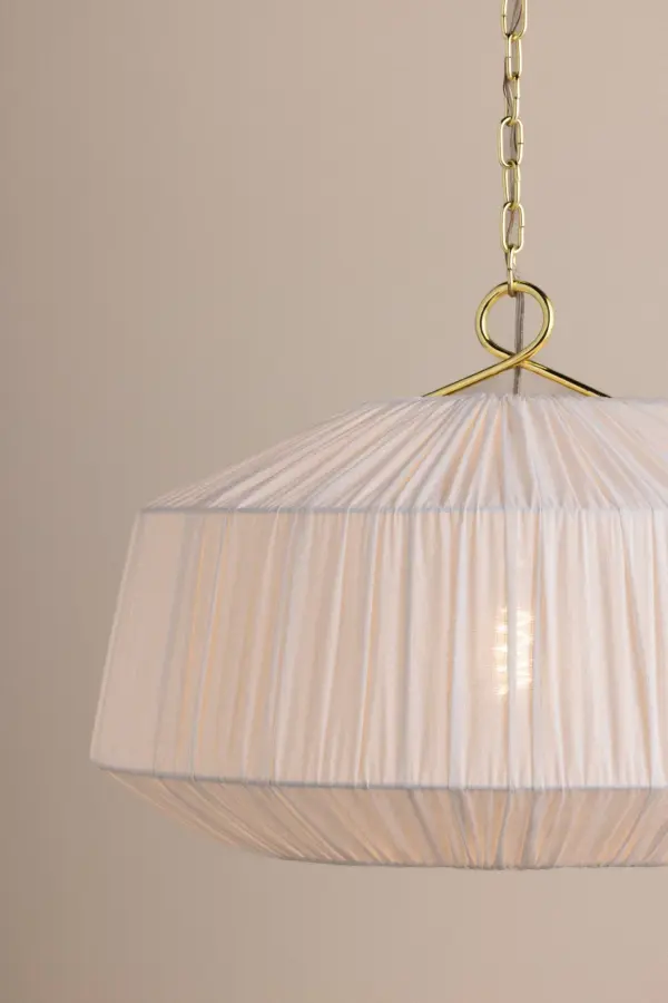 The Amanza pendant combines poetic beauty with practical design through its stretched linen shade and looped Aged Brass metalwork. Its abundant yet airy silhouette creates a neutral statement piece that complements various design schemes. - alternate view