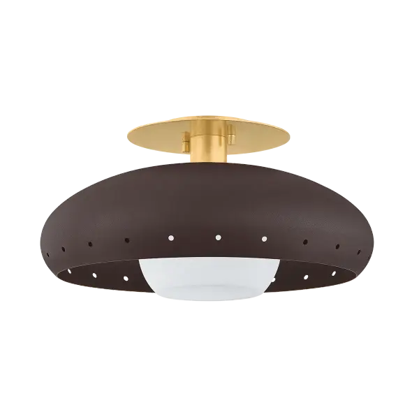 The Kimber flush mount combines minimalist restraint with luxurious details. Its domed bronze shade features decorative perforations that create a sparkle effect, while the vintage gold leaf interior adds warmth and sophistication.