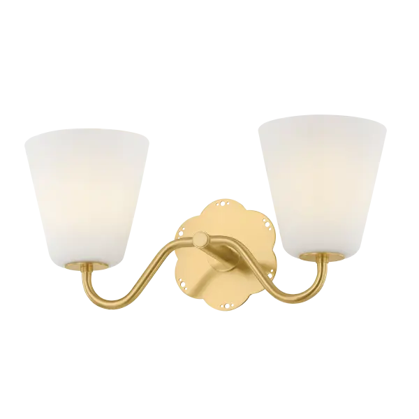 The Leonella sconce brings vintage charm to bath spaces with its botanical-inspired design. Swooping arms in Aged Brass extend from a decorative floral backplate, while matte white bell-shaped shades provide powerful downlight for daily routines.