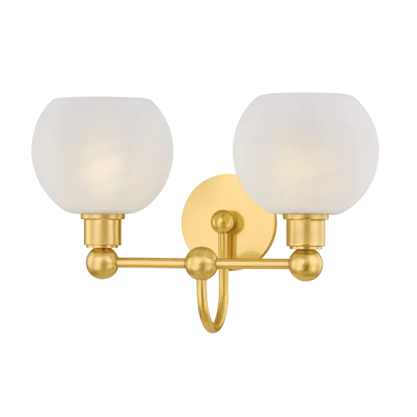 The Jerica bath light brings visual harmony through its continuous circular forms and decorative sphere details. Matte cloud glass globes provide soft, diffused illumination perfect for daily grooming routines.