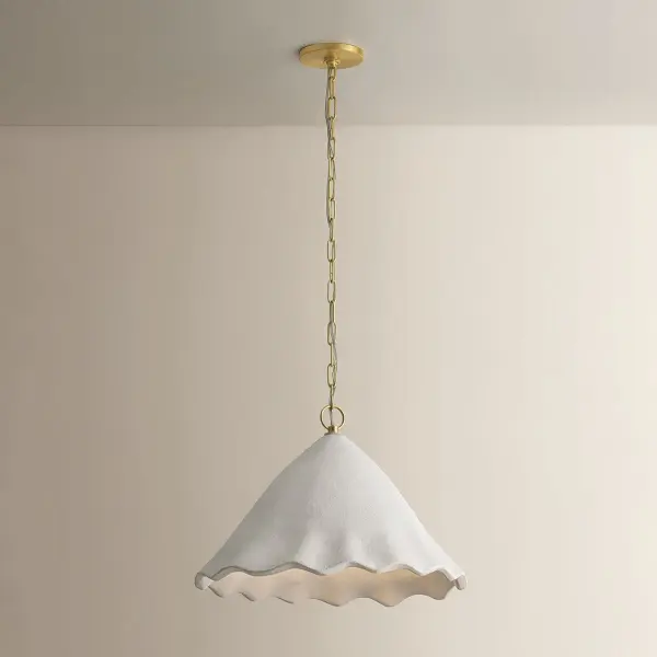 The Lulu Pendant brings organic elegance to intimate spaces with its tulip-inspired bell shade crafted from sustainable eco paper. The gentle suspension from an Aged Brass loop creates a contemplative focal point. - alternate view