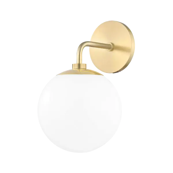 The Stella Wall Sconce brings fresh mid-century modern style with its sleek frosted globe and aged brass finish. Versatile enough for any room, this fixture combines classic curves with contemporary sensibility.