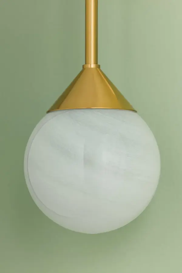 The Natasha Wall Sconce balances classic decadence with modern simplicity. Its swooping arch and cloud glass orb create a soft, sophisticated look that bridges traditional and contemporary design. - alternate view