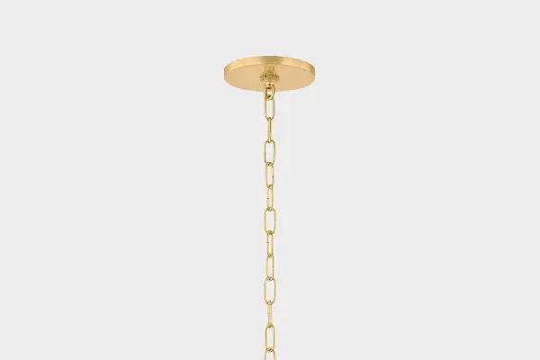 The Benita pendant combines delicate vintage glass vase aesthetics with innovative construction. Its light bronze glass shade creates a warm, inviting ambiance while the aged brass metalwork flows through the shade opening for visual continuity. - alternate view