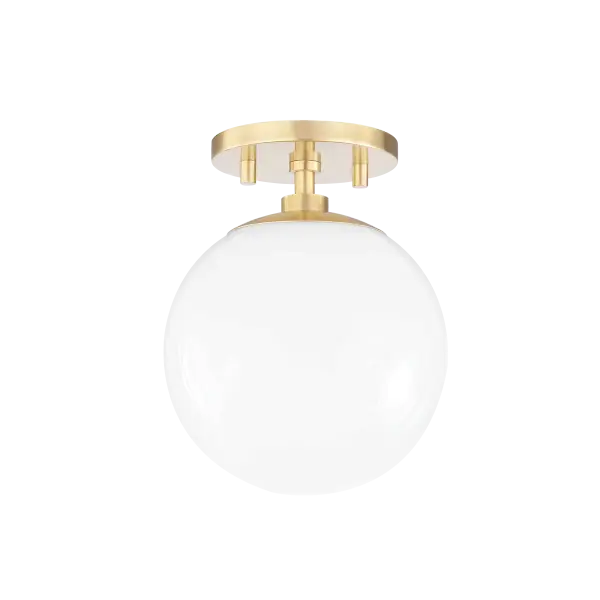 The Stella Semi Flush brings timeless mid-century modern design to any space with its frosted glass globe and sleek aged brass finish. Perfect for rooms with lower ceilings, this fixture offers soft, diffused lighting.