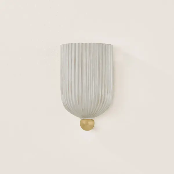 The Amira Wall Sconce brings ancient Greek-inspired elegance to modern spaces with its vertically ribbed ceramic shade and warm aged brass accents. Perfect for creating a calming, sophisticated atmosphere in intimate spaces. - alternate view