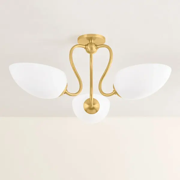 The Reva Semi Flush brings vintage charm through botanical-inspired S-curve arms and etched cloud glass shades. Its warm Aged Brass finish and uplight design create ambient illumination perfect for traditional and transitional spaces. - alternate view