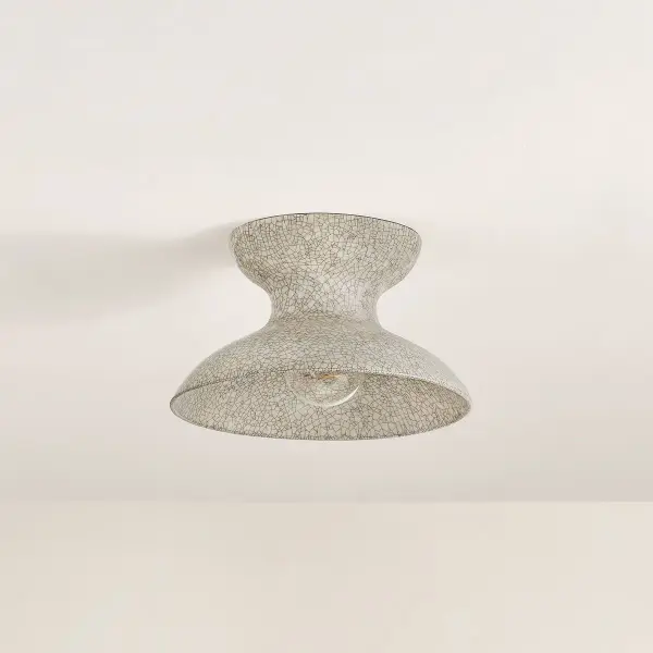The Carina flush mount beautifully bridges 1960s design with contemporary sensibility. Its organic ceramic shade and hidden brass hardware create a warm, approachable fixture perfect for modern kitchens and dining spaces. - alternate view