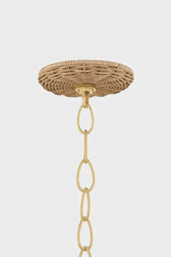 The Katniss Chandelier blends handwoven vintage natural wicker with aged brass for a sophisticated organic aesthetic. Its mushroom-shaped shades and curved arms create visual interest while adding warmth and texture to any space. - alternate view
