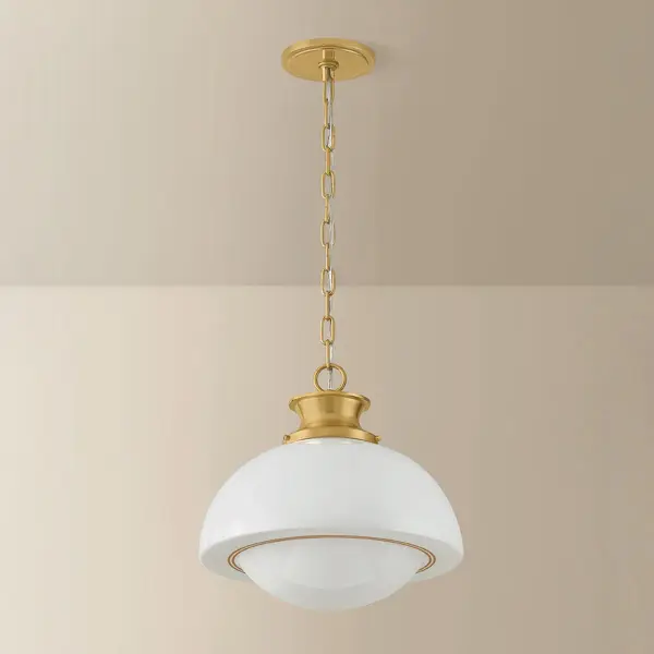 The Celine Pendant blends retro charm with modern sophistication. Its spot-plated opal glass shade diffuses light beautifully while thin gold pinstripes add refined visual interest. Perfect for intimate spaces seeking timeless style. - alternate view