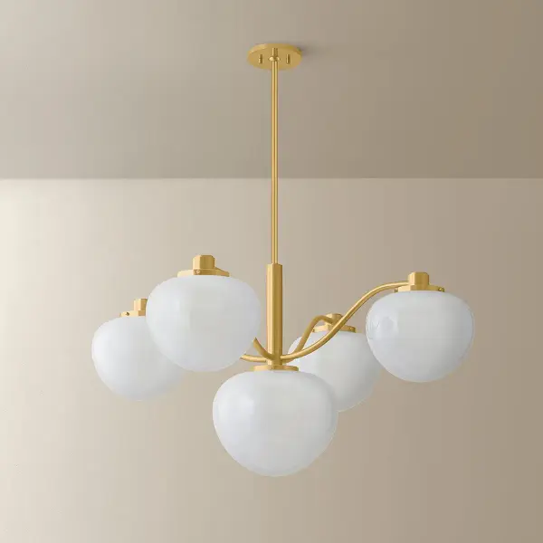 The Kristen Chandelier reimagines Art Deco design with playful proportions and statement Cloud Glass buds suspended from graceful stems. The warm Aged Brass finish adds organic elegance to dining rooms and entryways. - alternate view