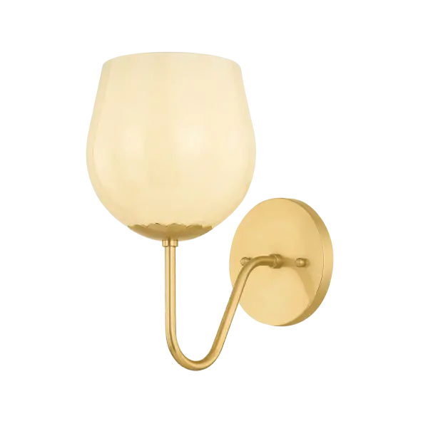 The Genevieve Wall Sconce brings vintage Italian charm with its botanical-inspired design. Unfurling arms support rosebud-shaped Cream Opal glass shades, while scalloped fitter details and Aged Brass finish add refined sophistication.